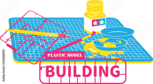 A table of assembling or building a plastic model of toy. Contains empty plastic model molds, paint, brush and pen cutter on a cutting mat. Suitable for decorating toy stores and model studios.