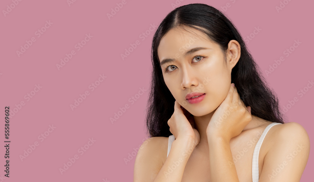 Beauty and spa. Young asian woman long hairstyle with fresh clean face skin looking camera pink pastel color background. Beauty and spa. Young asian woman long hairstyle with fresh clean face skin looking camera pink pastel color background.