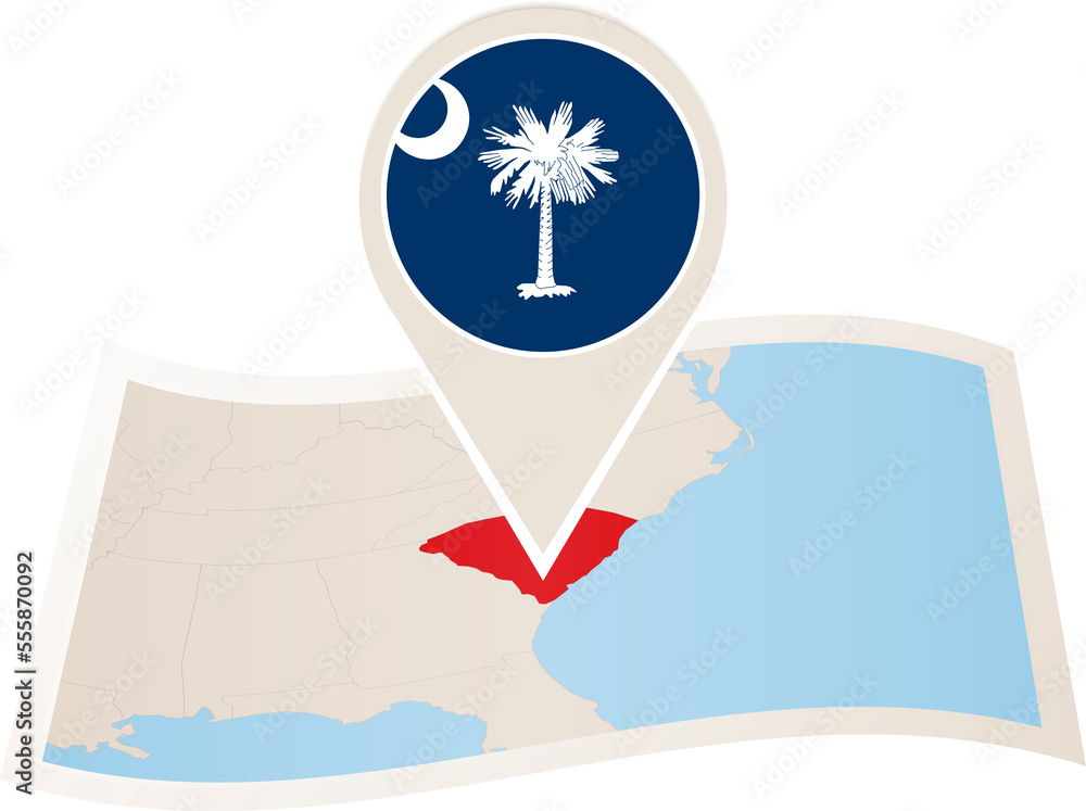 Folded paper map of South Carolina U.S. State with flag pin of South ...