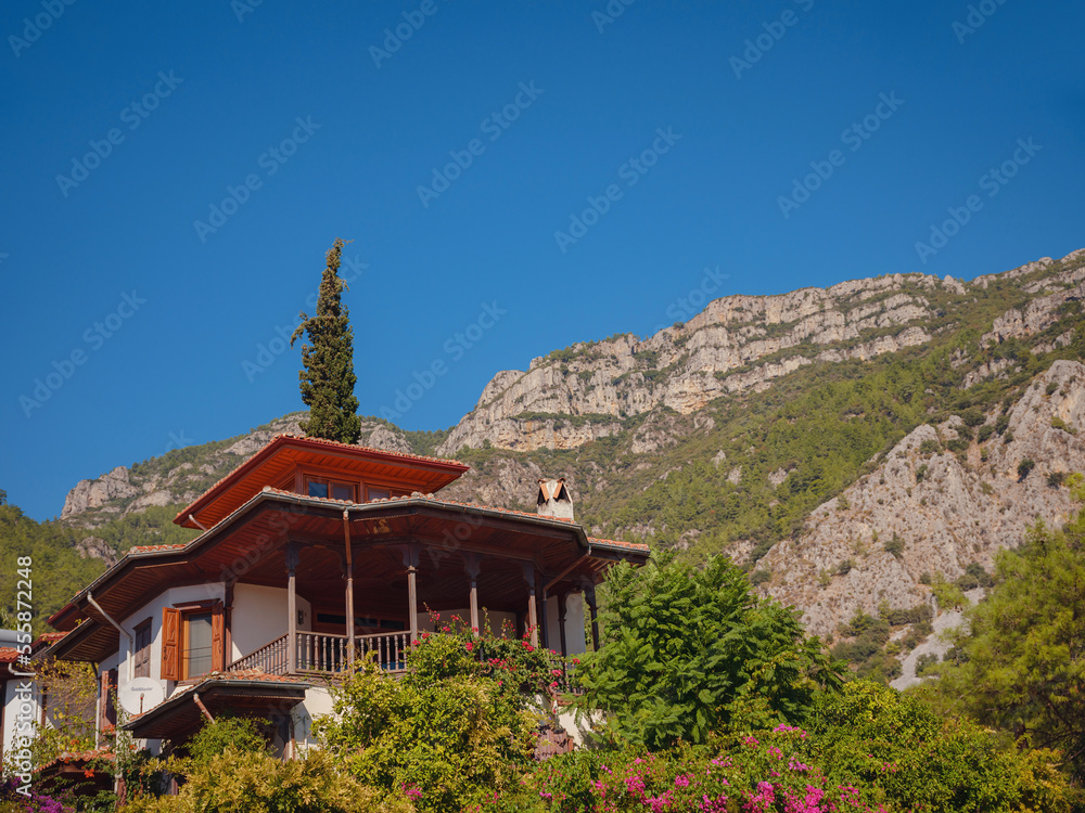 Akyaka, a coastal city in southwestern Turkey, is a growing center for international tourism. sunny warm autumn day, Beautiful traditional turkish houses Akyaka, a coastal city in southwestern Turkey, is a growing center for international tourism. sunny warm autumn day, Beautiful traditional turkish houses
