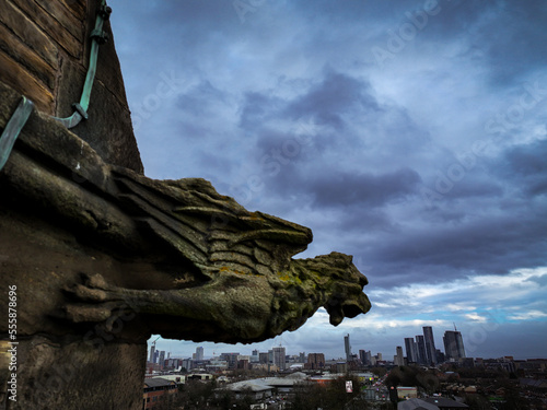 Canvas-taulu Menacing Gargoyle Looming Over Manchester