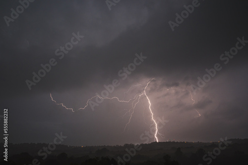 Storm clouds and lightning over the countryside