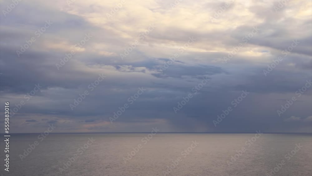 Sunrise on the sea background. Cloudy sunrise in a dramatic sky over the sea. Calm water and beautiful morning light. Sunrise on the sea background. Cloudy sunrise in a dramatic sky over the sea. Calm water and beautiful morning light.