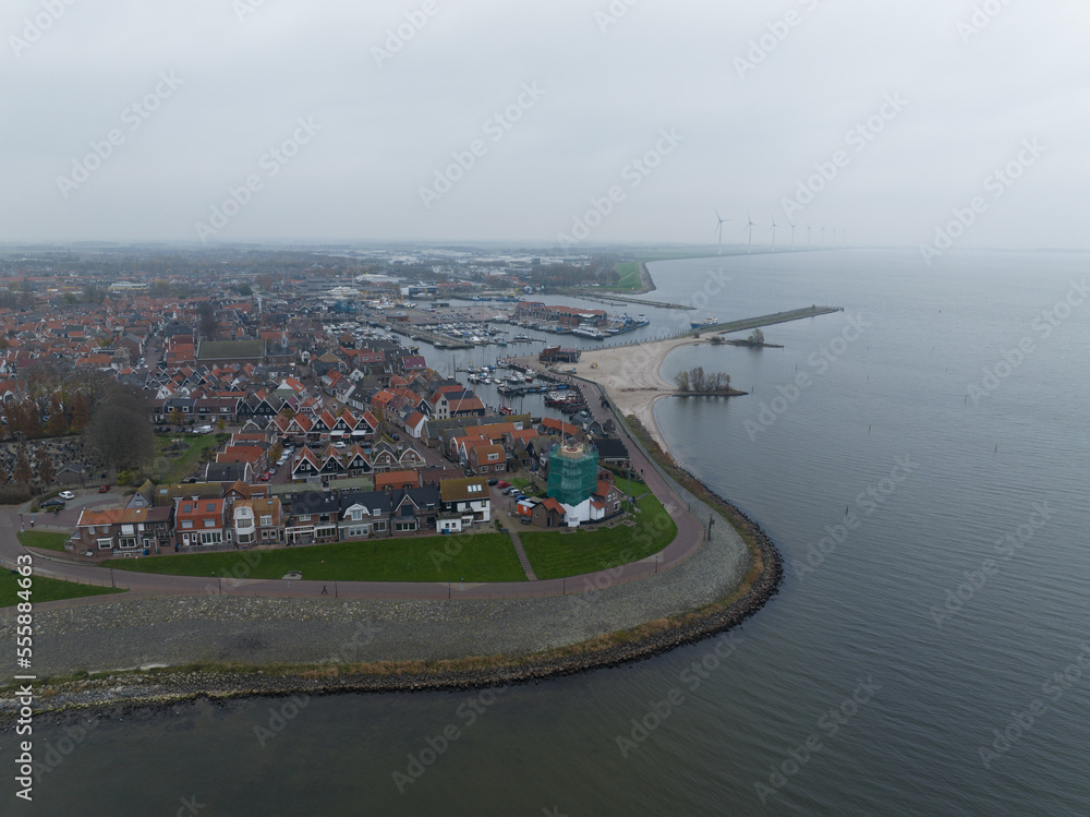 Urk former island andmunicipality in the province of Flevoland in the Netherlands. most religious municipality in the Netherlands. close-knit community. Largest fishing fleet. Aerial Urk former island andmunicipality in the province of Flevoland in the Netherlands. most religious municipality in the Netherlands. close-knit community. Largest fishing fleet. Aerial