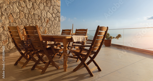 Brown wooden chairs and table in outside garden or balcony  Set furniture of terrace for relax