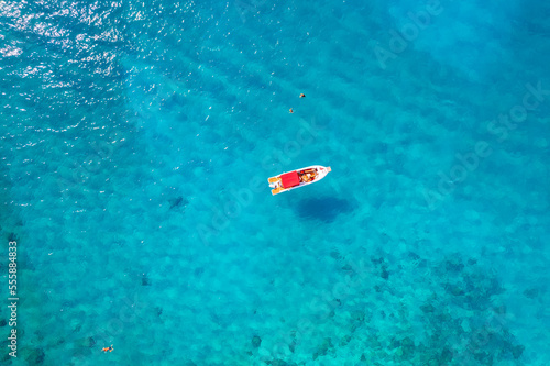 Aerial view beautiful white yacht on clear blue sea Malta. Concept cruise travel by drone © Parilov