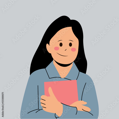 Schoolgirl hugging a book