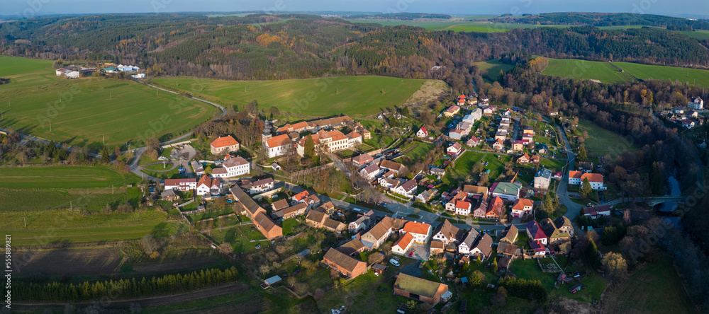 Aerial view of the village Svojšín in the Czech Republic on a sunny day in autumn .
