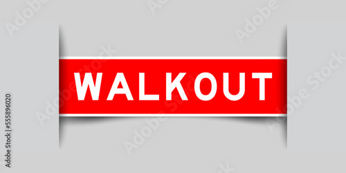Inserted red color label sticker with word walkout on gray background
