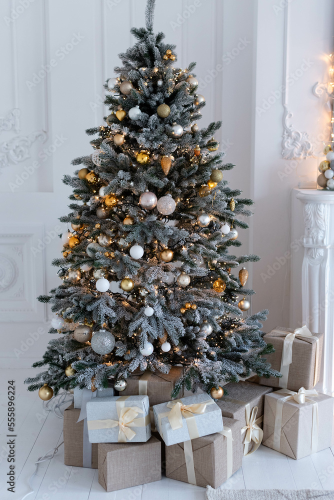 Christmas decorations with gift boxes under the Christmas tree Christmas decorations with gift boxes under the Christmas tree