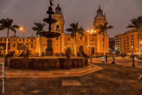 The main square - Plaza de Armas - with the Basilica Cathedral and the fountain in Lima, the capital of peru, at night.