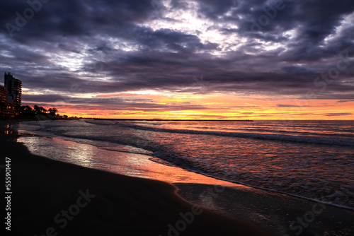 Spectacular and colorful sunrise on the beach © SoniaBonet