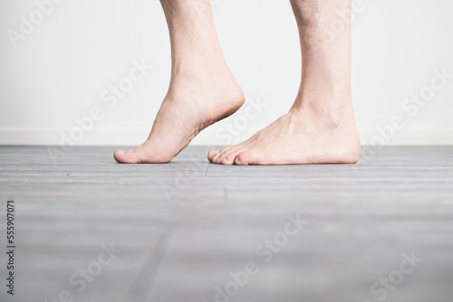 Male feet barefoot on floor © crazyALEX.de GmbH