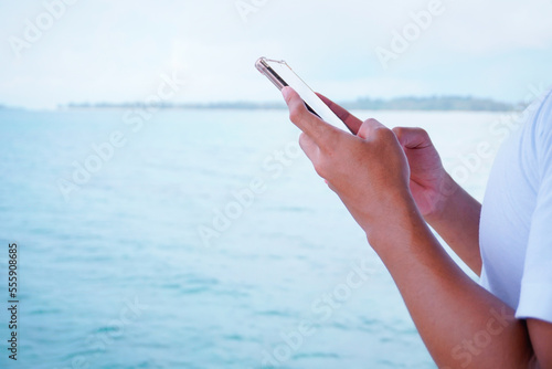 Wallpaper Mural person using digital tablet Torontodigital.ca