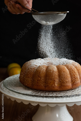 cake with chocolate frosting, lemon, strawberry, corn, passion fruit