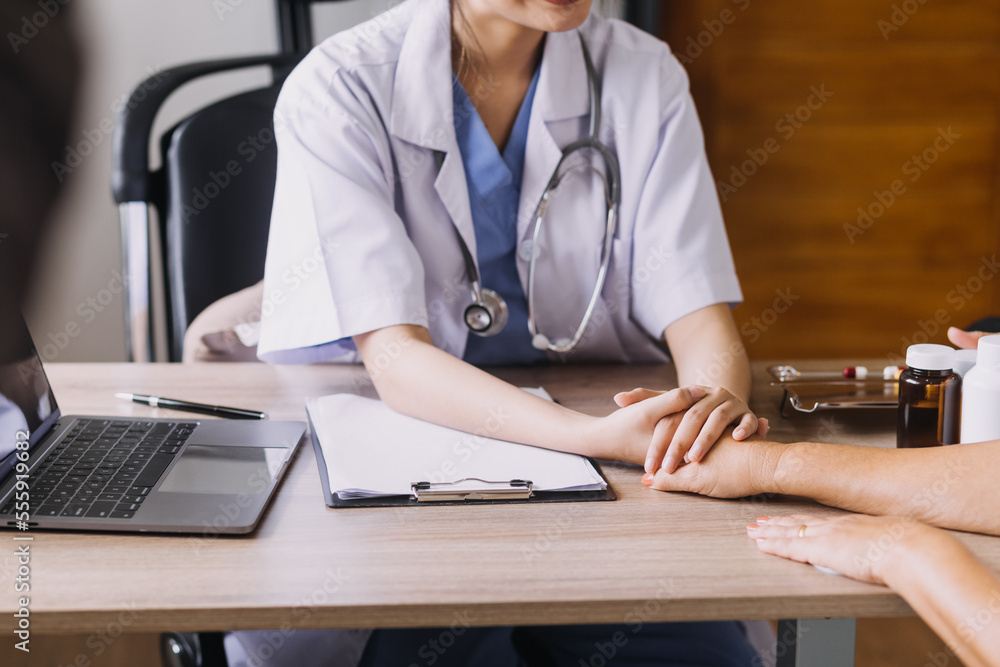 Homecare nursing service and elderly people cardiology healthcare. Close up of young hispanic female doctor nurse check mature caucasian man patient heartbeat using stethoscope during visit Homecare nursing service and elderly people cardiology healthcare. Close up of young hispanic female doctor nurse check mature caucasian man patient heartbeat using stethoscope during visit