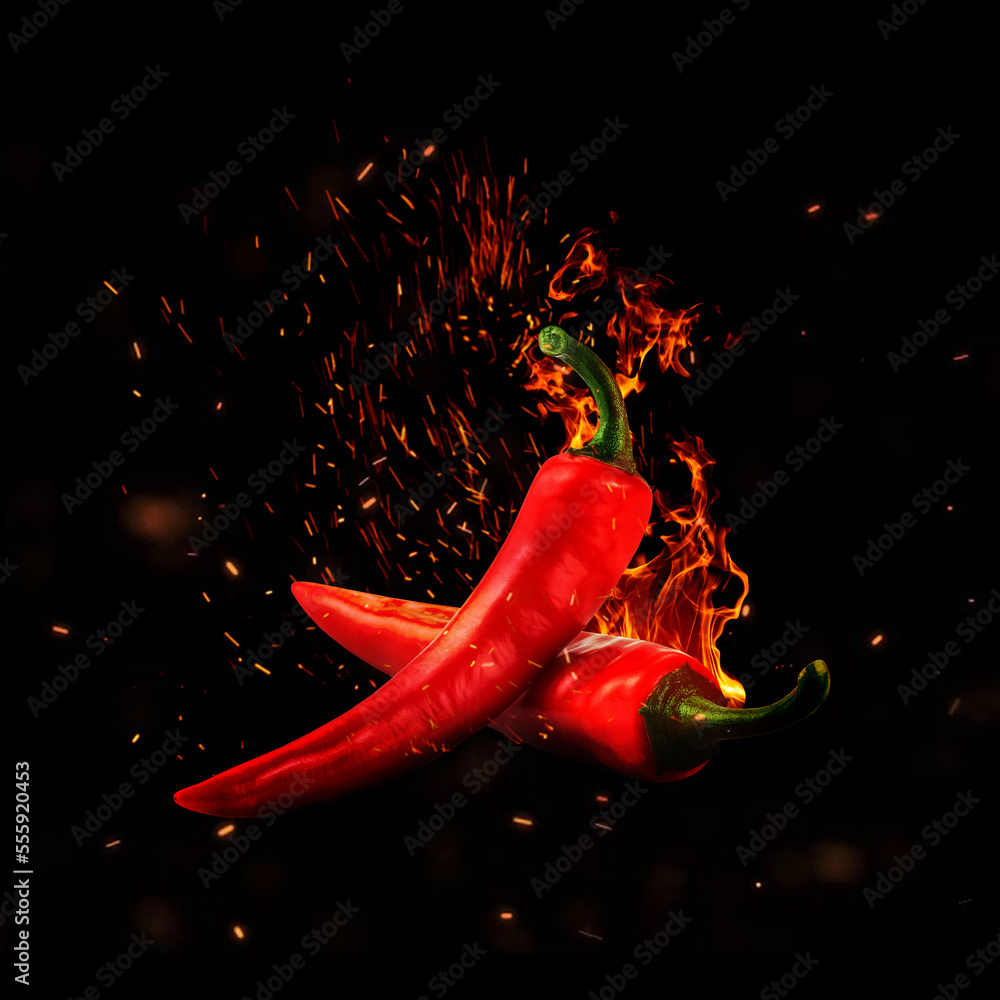 Fototapete mit Brennende Chilischoten in heller Glut #555920453
