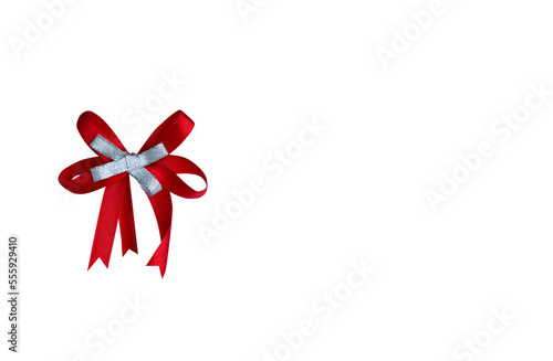 Red and white ribbons made beautiful bow on isolated background