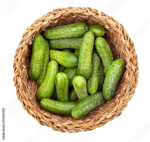 pickling cucumber in a basket path isolated on white top view