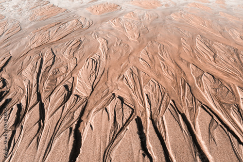 Sand structures, trickles, coombs, creeks and ravines at low tide, seems like another planet landscape photo