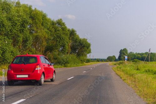 Highway wide road, transport and blue sky with clouds on a summer day © Kozlik_mozlik