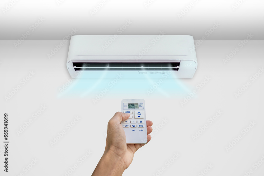 Man turning on the air conditioner. Man turning on the air conditioner.