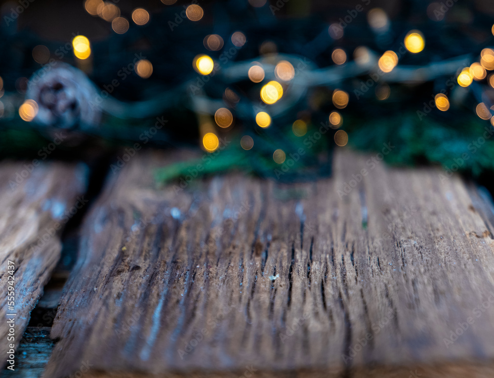 empty wooden table and Christmas lights