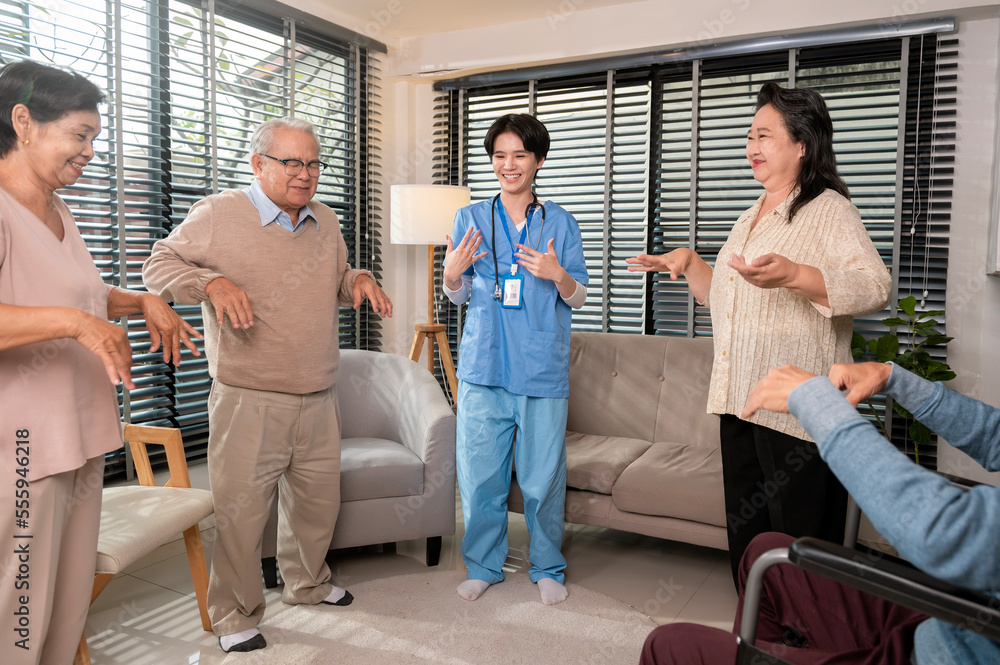 Group of Asian senior people are given advice by professional self care psychologist at elderly healthcare center, elder group therapy Geriatric consultation concept Group of Asian senior people are given advice by professional self care psychologist at elderly healthcare center, elder group therapy Geriatric consultation concept
