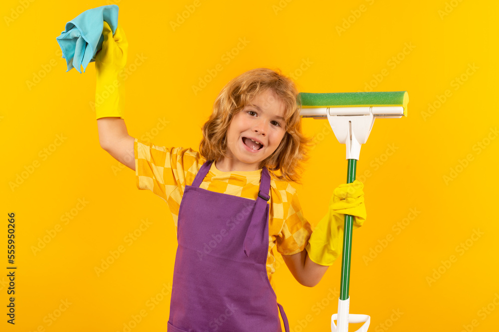 Kid helping with housework, cleaning the house. Cleaning accessory, cleaning supplies. Studio isoalted portrait of child helping with housework, cleaning the house. Housekeeping, home chores.