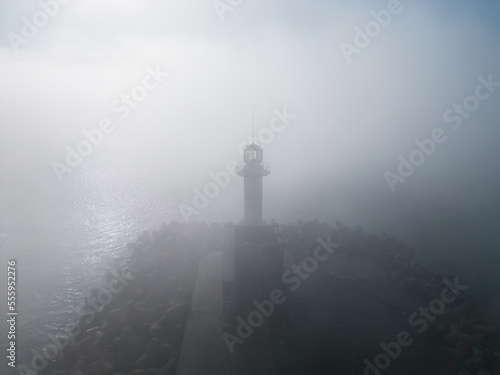 Fotografie Lighthouse in a foggy sea. Varna, Bulgaria