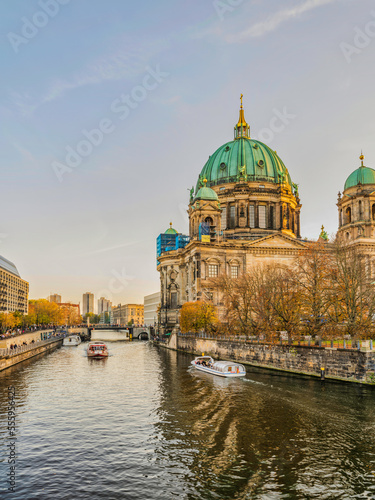 Vertical shot of Berlin Cathedral on Spree river during sunset, Germany