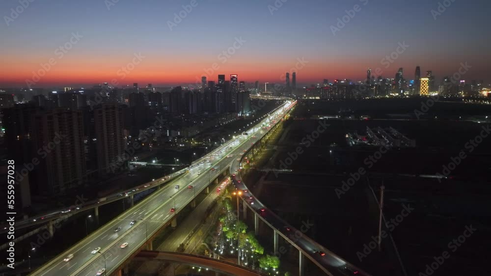 Aerial top view photo of highway multilevel junction road in urban at night Aerial top view photo of highway multilevel junction road in urban at night