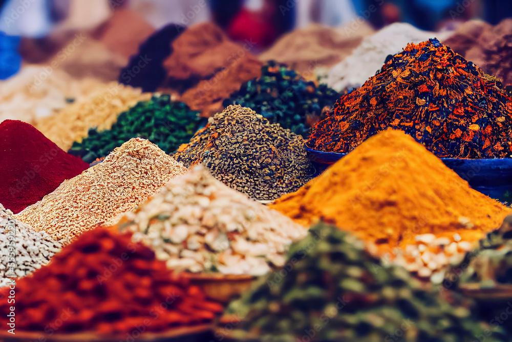 Fototapeta premium Piles of spices on display at a Moroccan souk market in a medina, generative AI