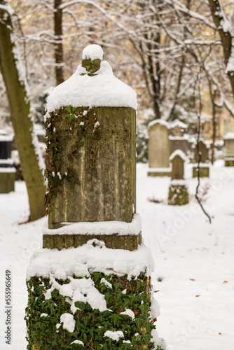 old grave yard covered in snow haunted and decaying © andybe