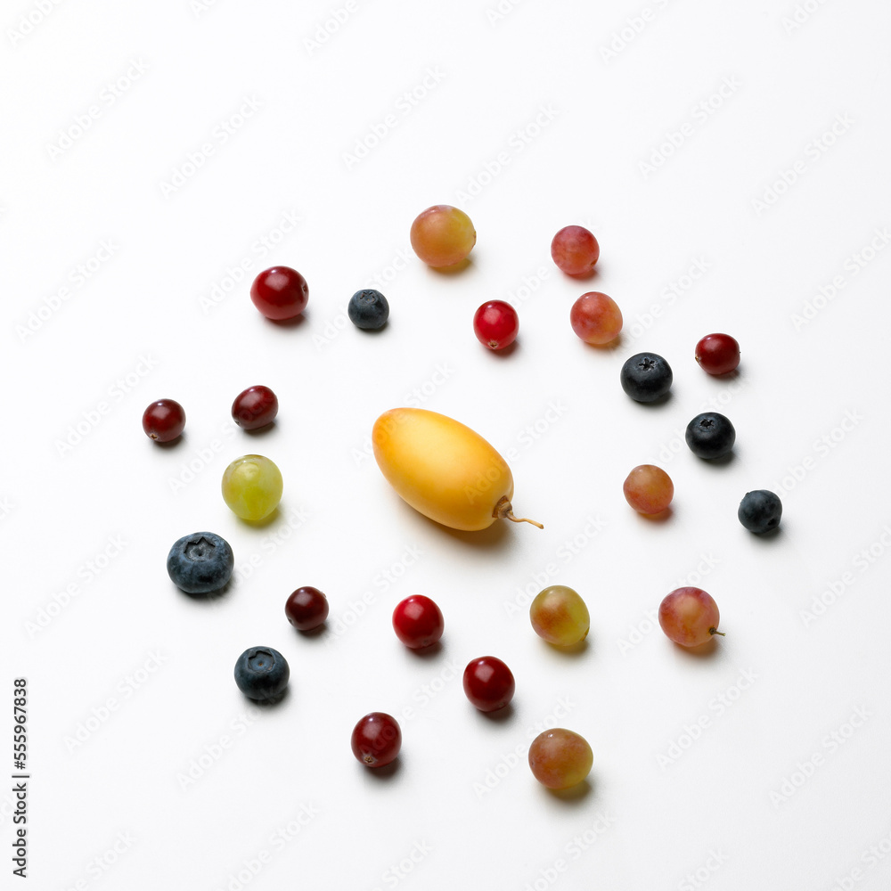 Variety of Fruit Surrounding Fresh Date Variety of Fruit Surrounding Fresh Date