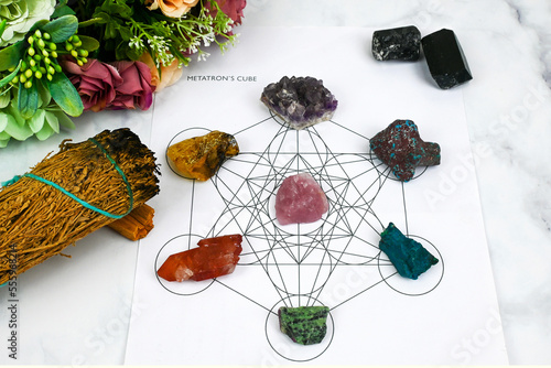 Burning smudge white sage with Merkaba, Metatron’s Cube sacred geometry space, alternative crystals healing, spiritual, rituals, cleanse negative energy, raise vibrations, frequency, mindful living