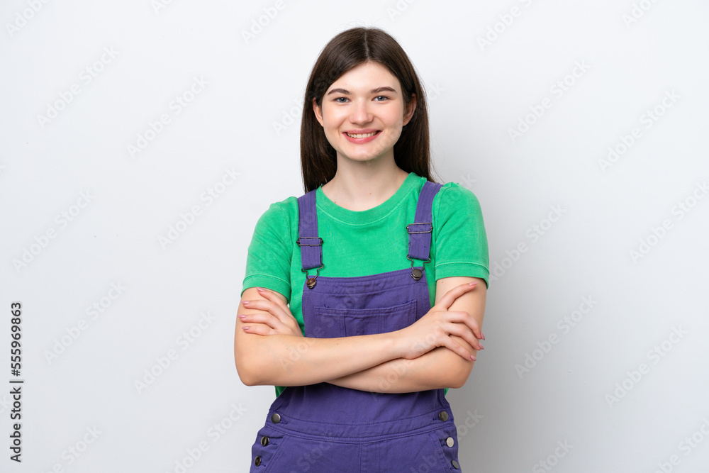 Young Russian woman isolated on blue background keeping the arms crossed in frontal position Young Russian woman isolated on blue background keeping the arms crossed in frontal position