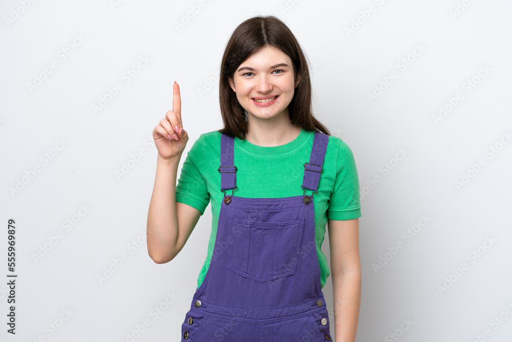 Young Russian woman isolated on blue background pointing up a great idea Young Russian woman isolated on blue background pointing up a great idea