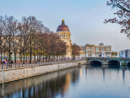 Humboldt Forum dom and Kupfergraben canal during fall before sunset photo