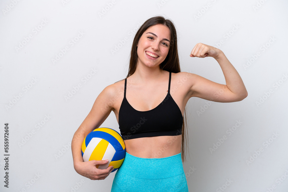 Young caucasian woman playing volleyball isolated on white background doing strong gesture Young caucasian woman playing volleyball isolated on white background doing strong gesture