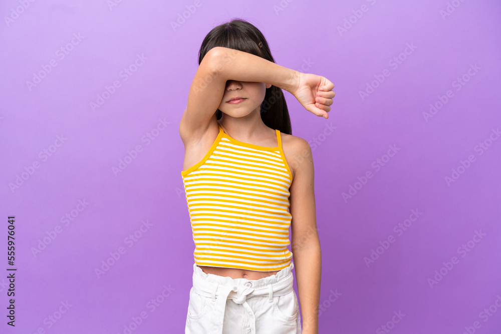 Little caucasian kid isolated on purple background covering eyes by hands Little caucasian kid isolated on purple background covering eyes by hands