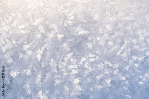 A structure of ice crystals with a color gradient that can be used as a background