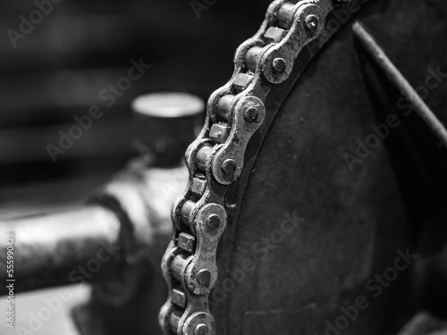 The old and vintage chain belt of a engine photo