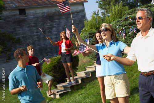 Family Celebrating the 4th of July, Belgrade Lakes, Maine, USA photo