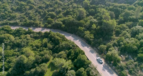 Aerial view of a sport car driving in a woodland, Carmel Forest, Haifa, Israel photo