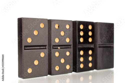 Several dominoes, macro, isolated on white background.