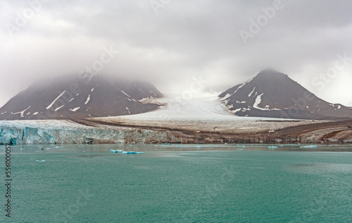 Tidal Glacier Coming Out of the Clouds
