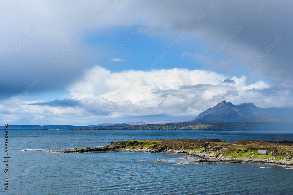 Scottish coast with dramatic cloud formations on the Isle of Skye in Scotland, United Kingdom Scottish coast with dramatic cloud formations on the Isle of Skye in Scotland, United Kingdom