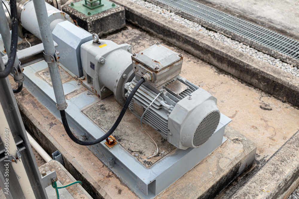 a centrifugal pump installed in an oil refinery or chemical facility and driven by an electric motor. Utilized in industrial Factory to convey liquids to various factory production units. a centrifugal pump installed in an oil refinery or chemical facility and driven by an electric motor. Utilized in industrial Factory to convey liquids to various factory production units.