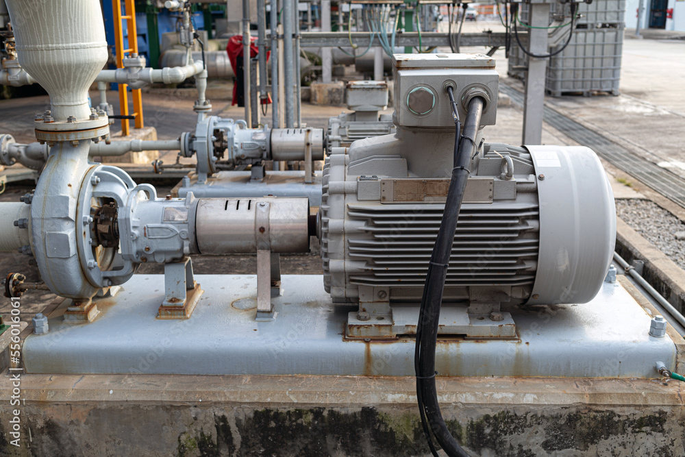 an electric motor-driven centrifugal pump that is put in an oil refinery or chemical factory. Industrial and technological work concept to transmit liquids to various production units of enterprises.